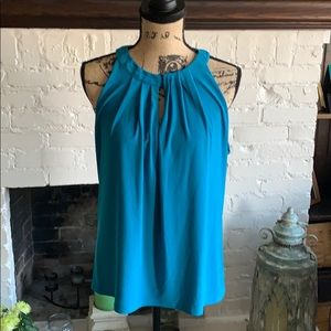 Beautiful turquoise lined shell blouse